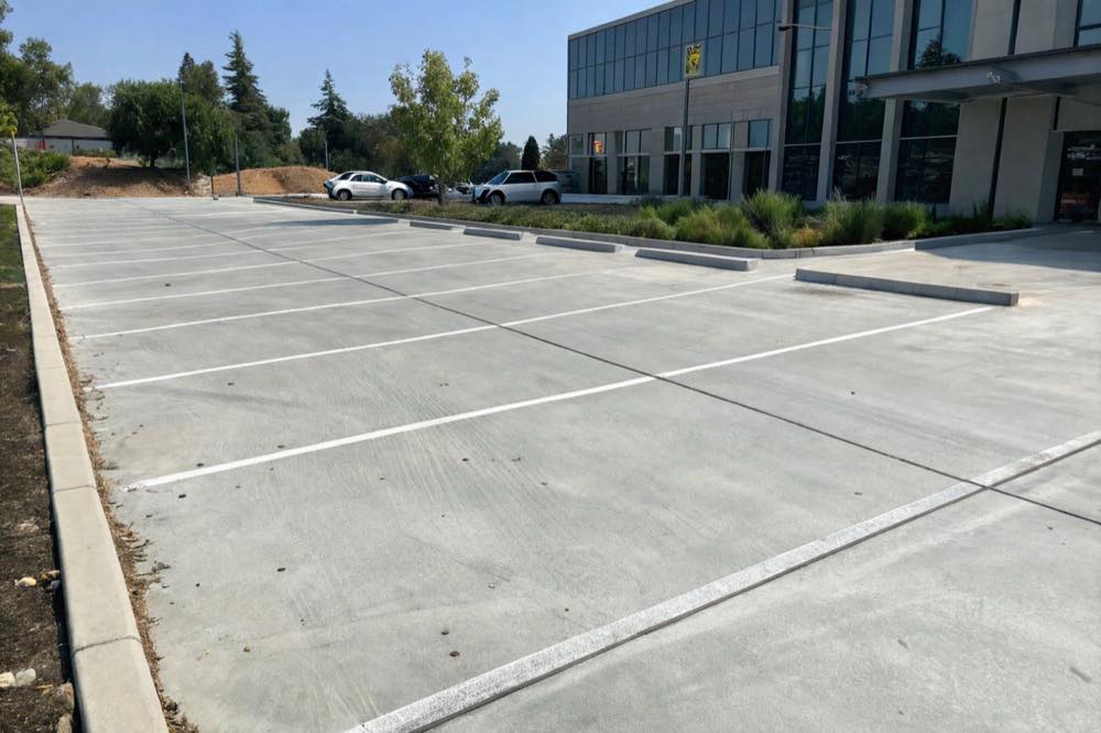 Concrete parking lot building